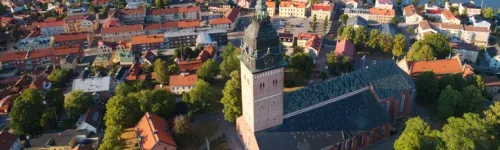 Strangnas cathedral Strangnas, Sweden - July 16, 2018: Aerial view of the scandinavian brick gothic Strangnas cathedral surronded by the town.